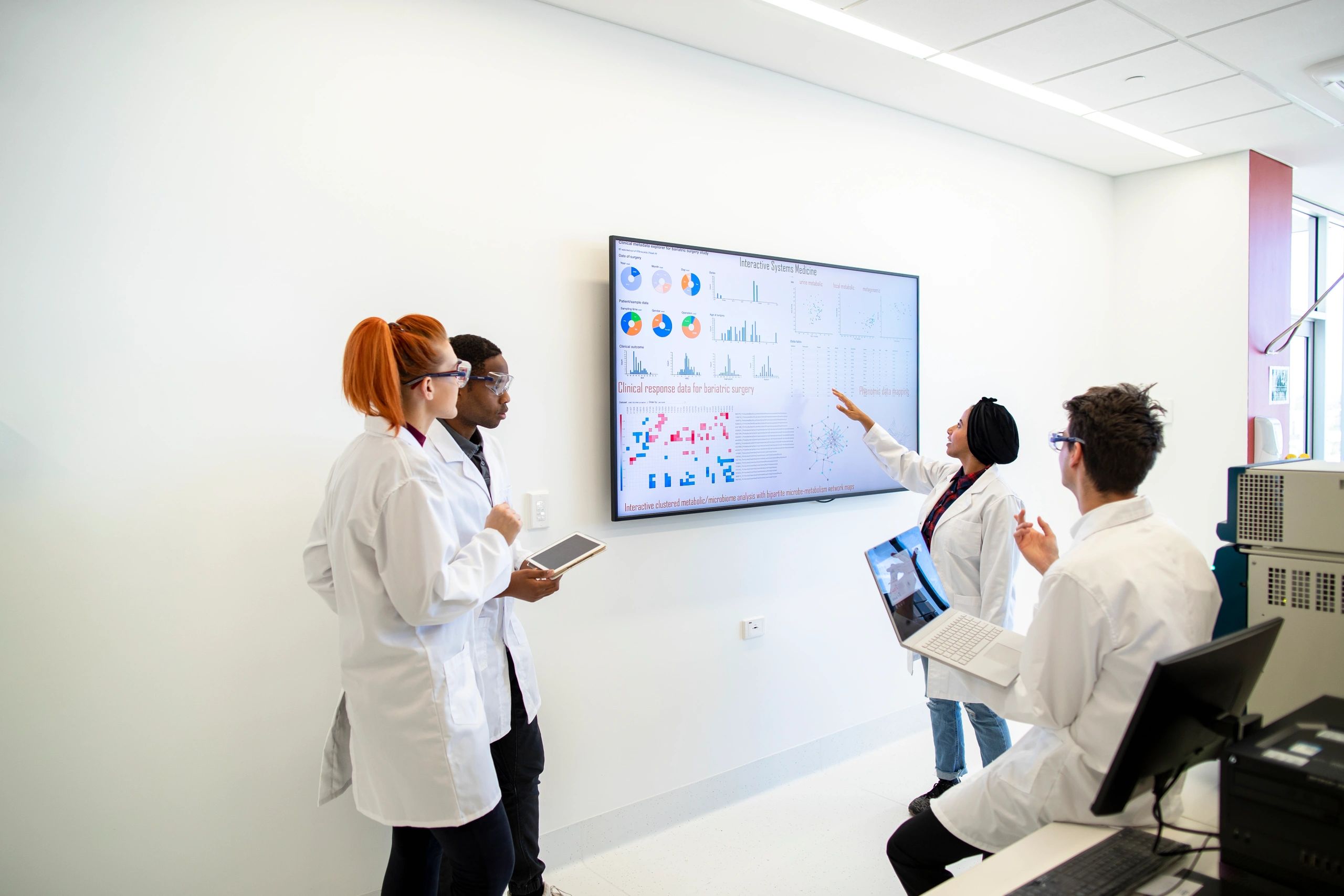 Medical professionals reviewing clinical information together