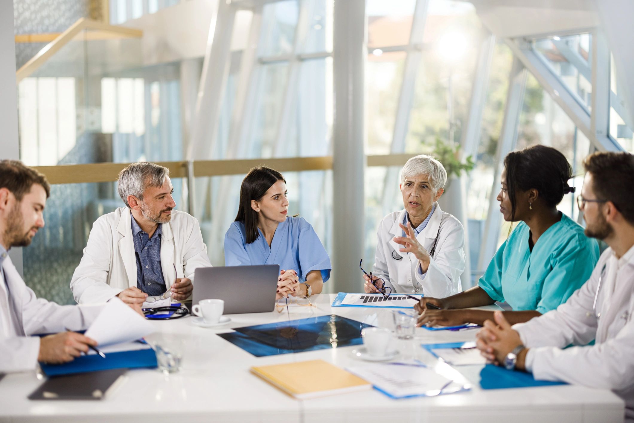 Medical specialists meeting during an educational session