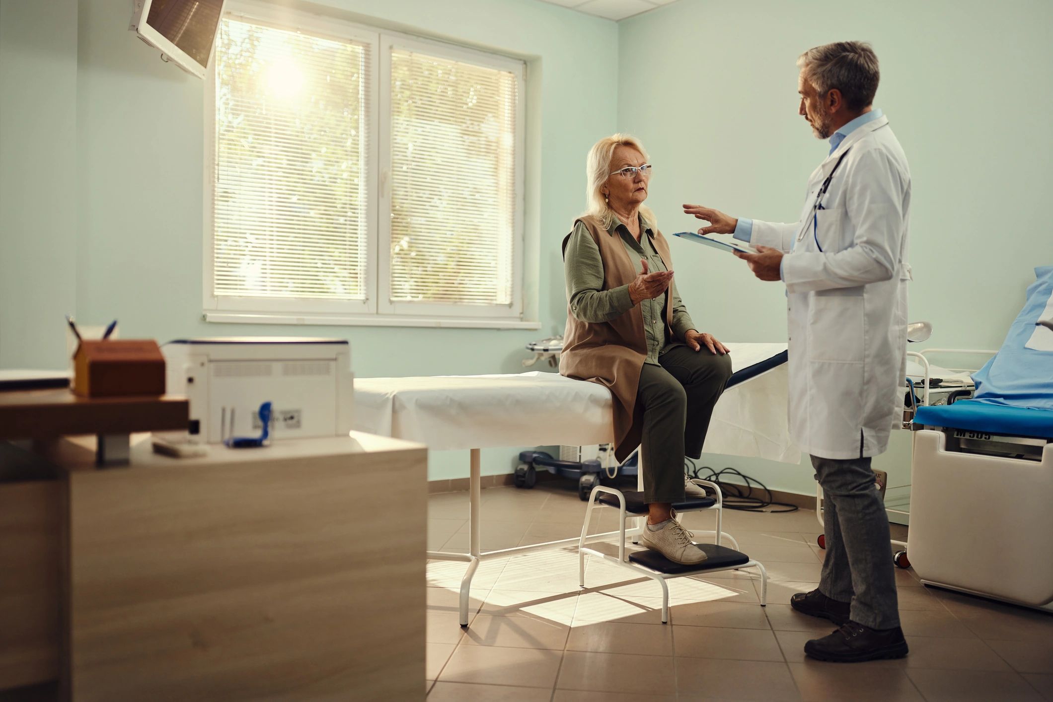 Doctor consulting with a patient in a hospital setting