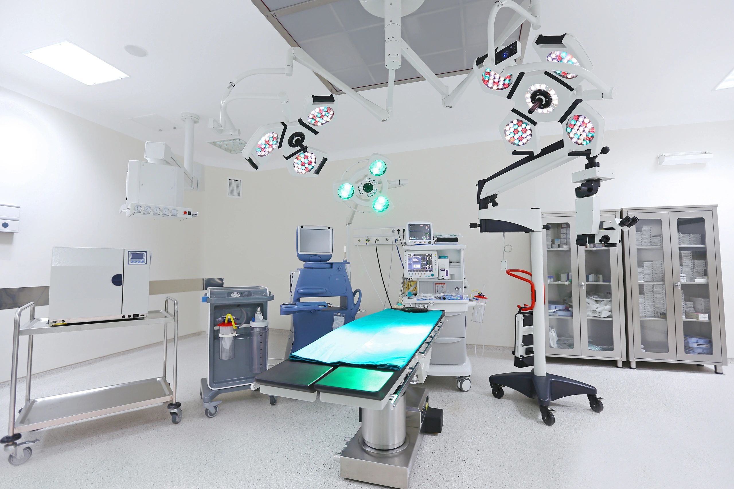 Surgical suite with monitors and procedure equipment