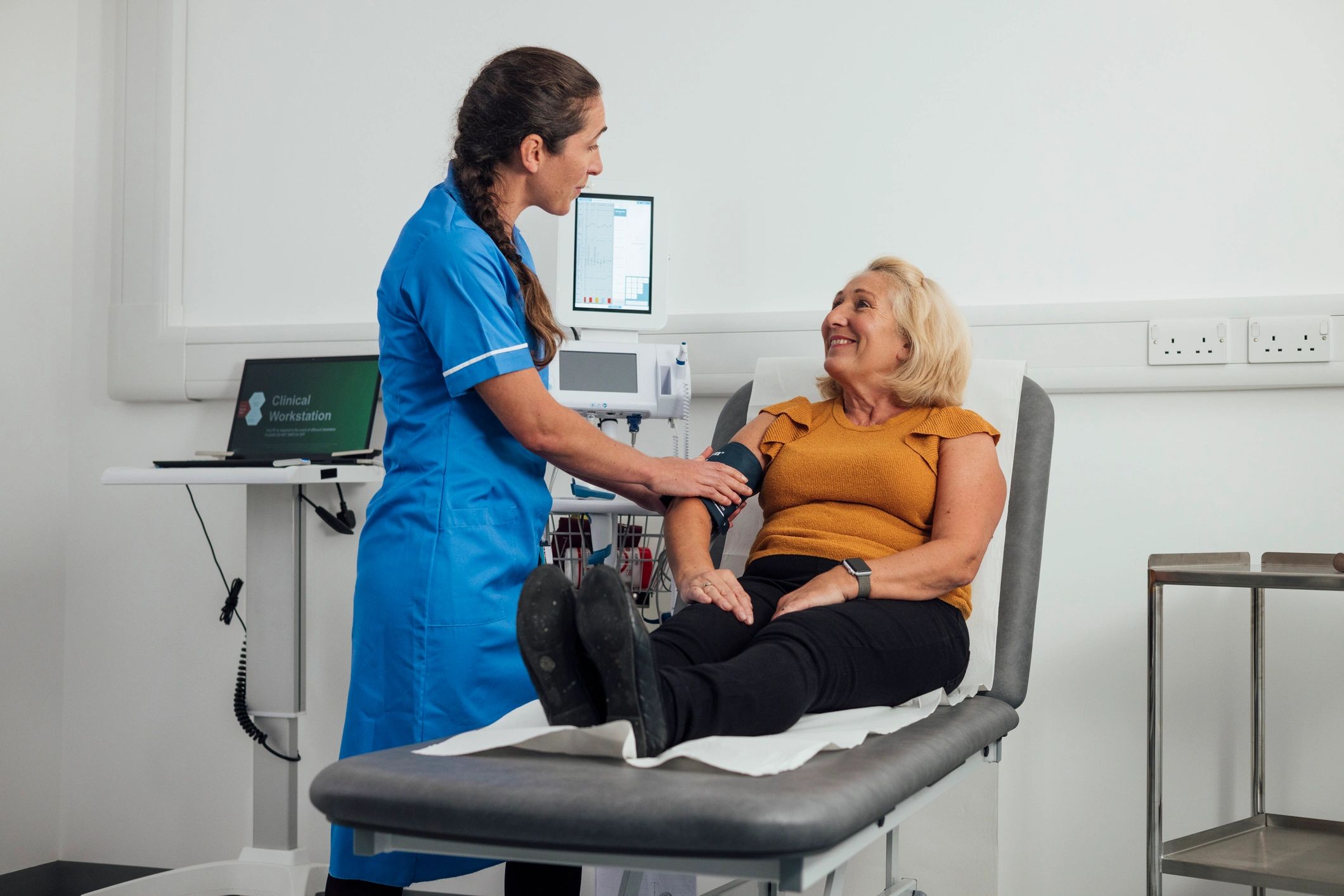 Healthcare professional assisting a patient